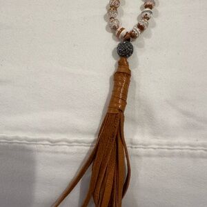 Beaded necklace with cognac tassel